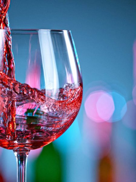 Wine glass filling with red Wine glass filling with red